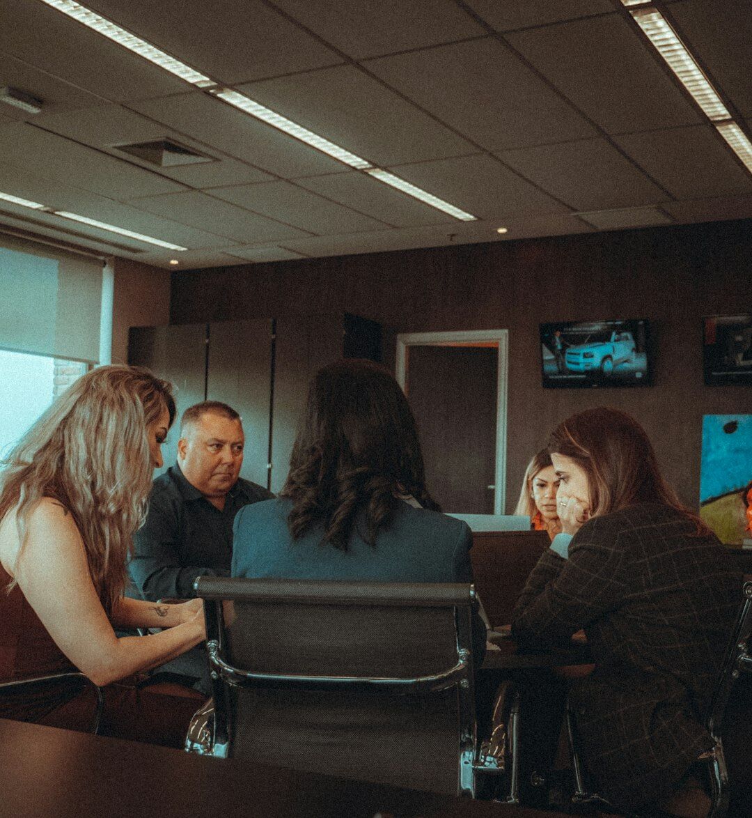 Group of diverse Brazilian people talking in a respectful circle