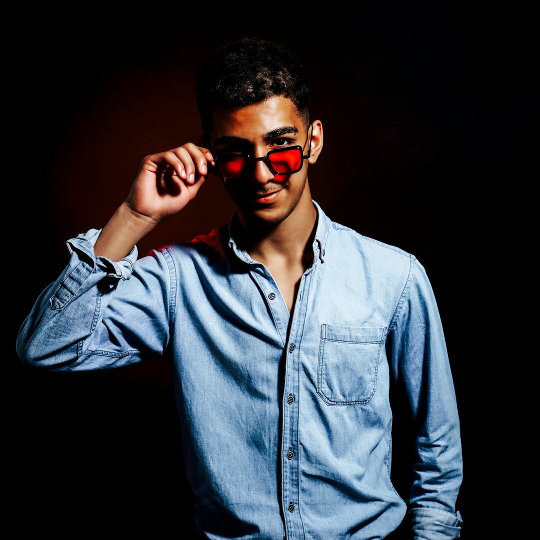 Portrait of a Brazilian man with glasses smiling