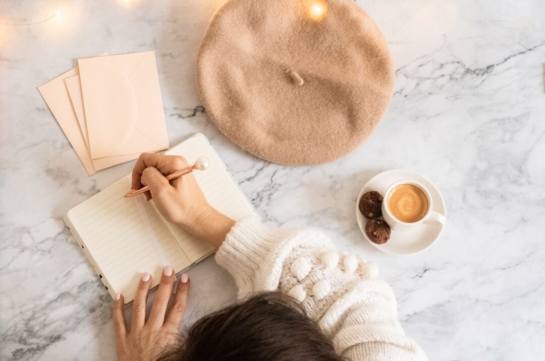 woman writing in journal