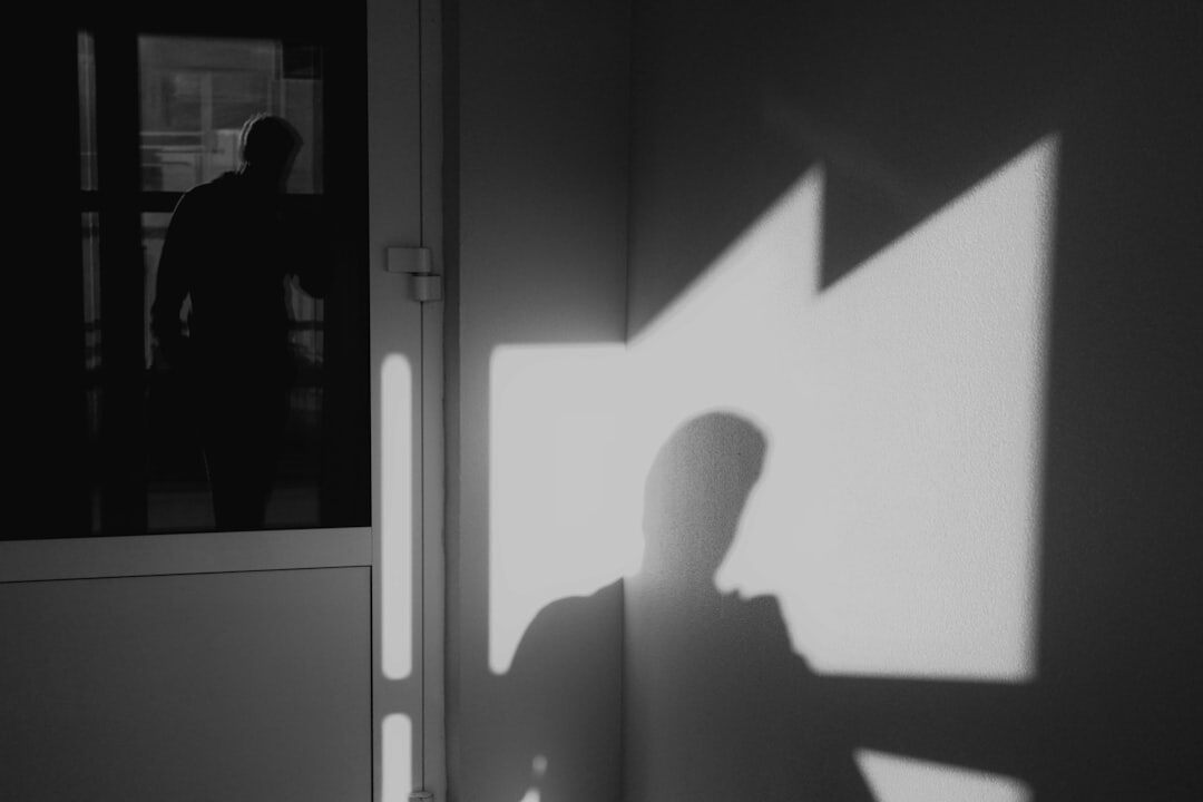 person meditating in quiet room