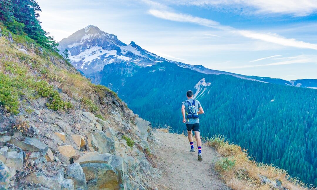 person hiking on trail