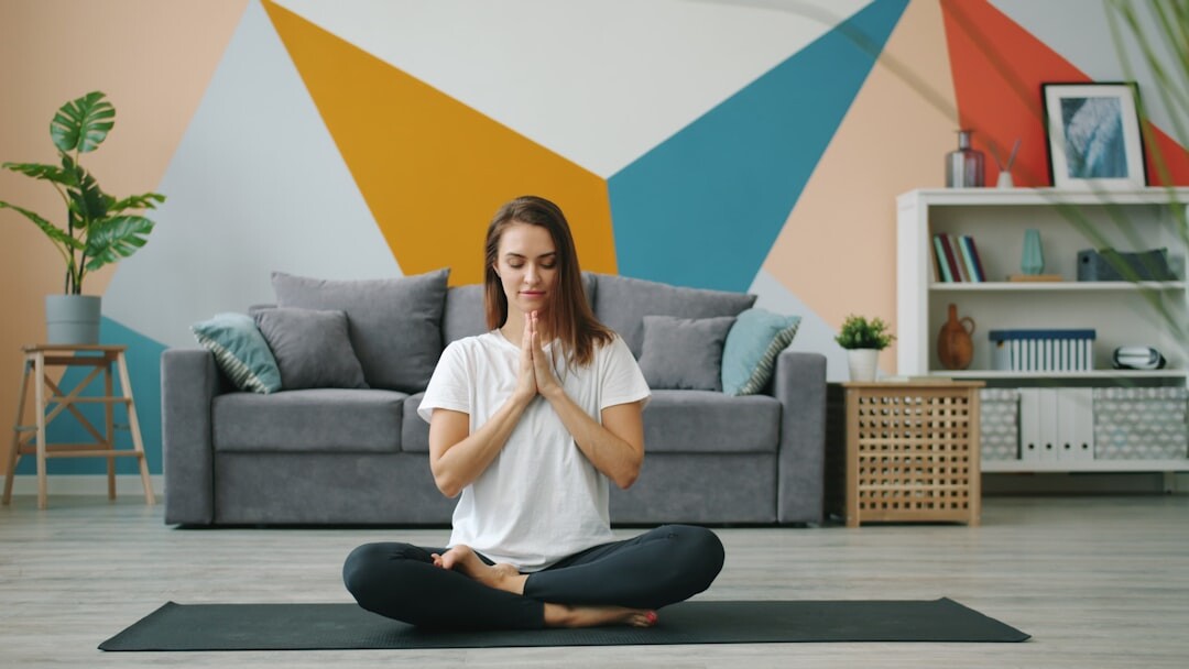 person meditating at home